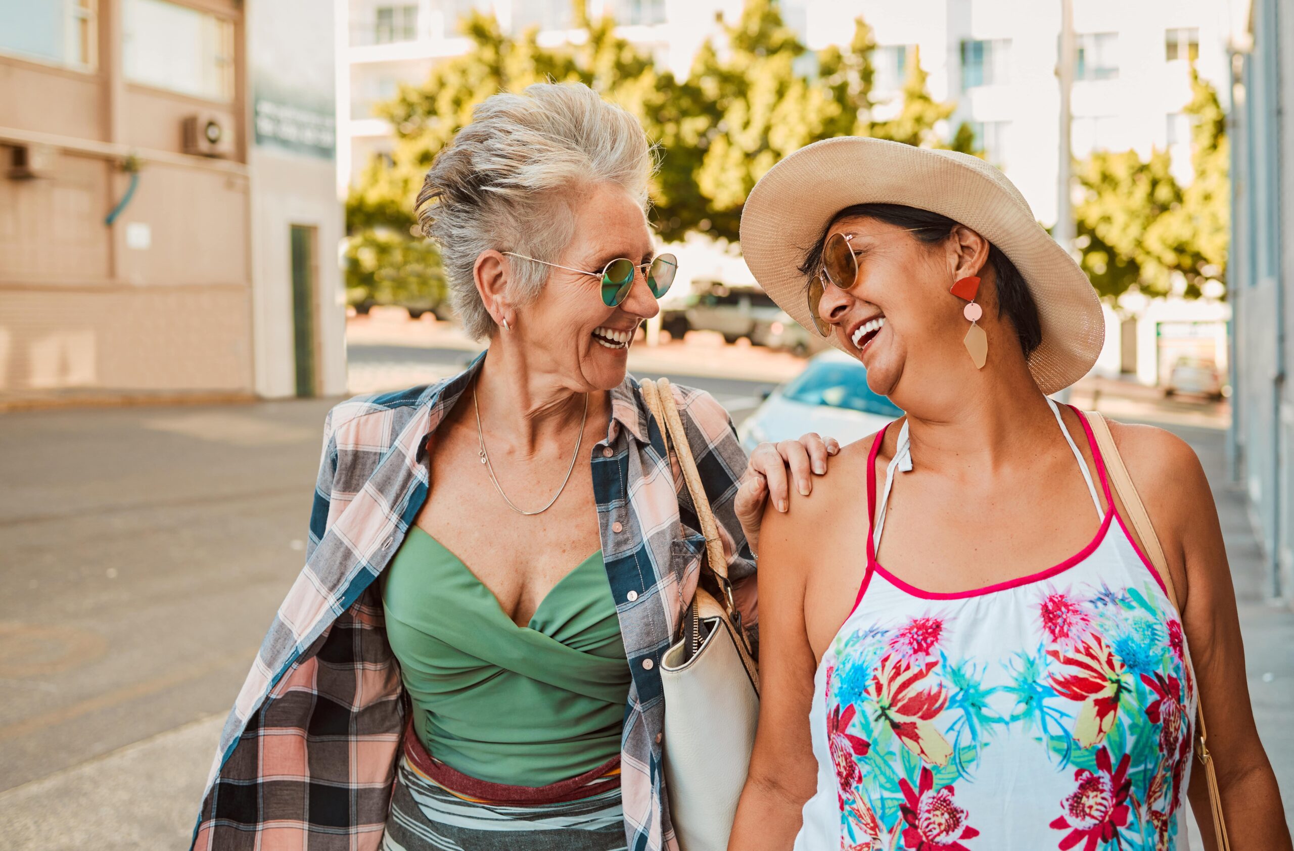 happy-senior-women-and-laugh-in-city-for-walking-2023-02-25-00-31-44-utc-min