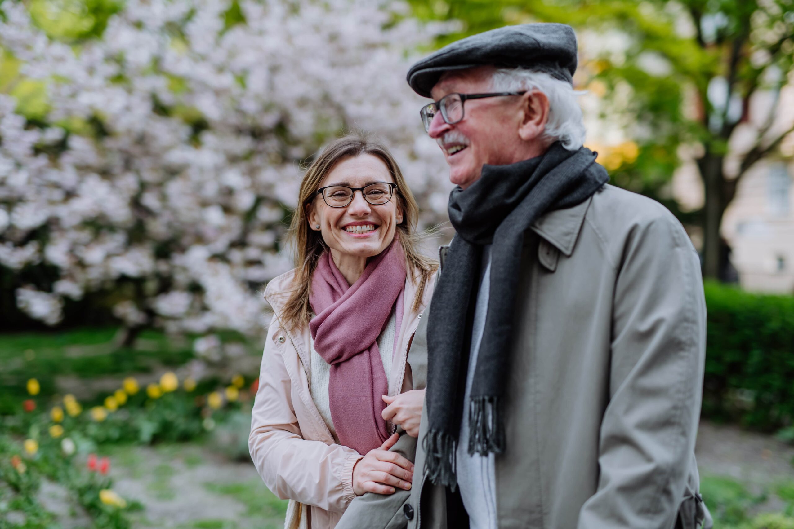 happy-senior-man-with-adult-daughter-outdoors-on-a-2023-11-27-04-49-35-utc-min