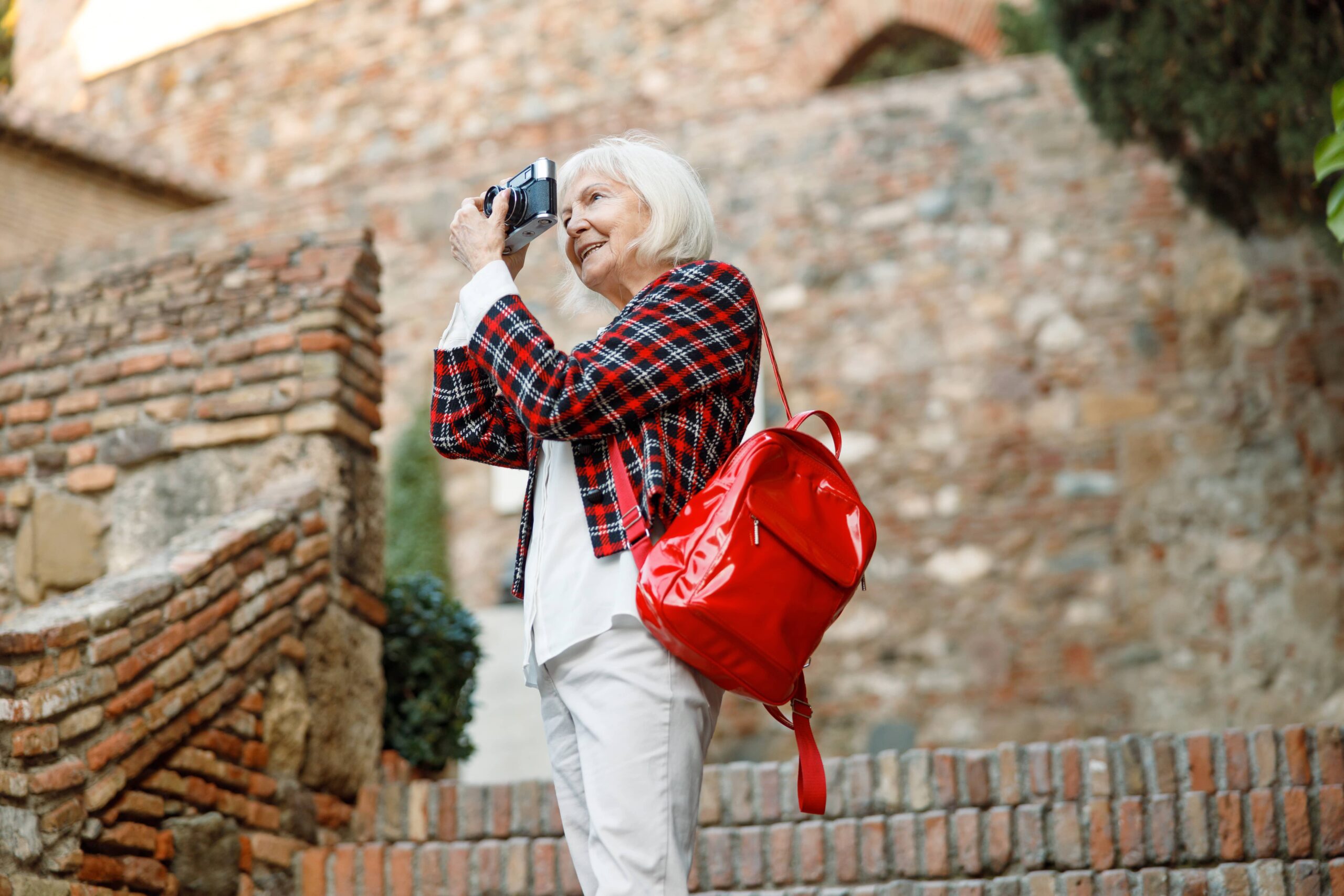 senior-lady-spending-time-at-urban-area-2023-11-27-05-13-53-utc-min